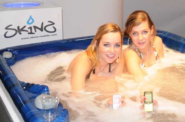 Two girls in a hot tub