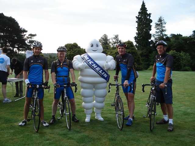 The PocketGPSWorld team posing with Bibendum before the start