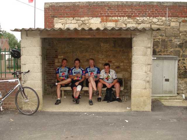 These guys found the bar full so they took refuge in the bus shelter.